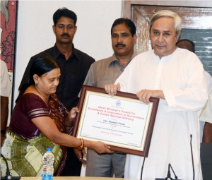 Chief Minister confering awards
