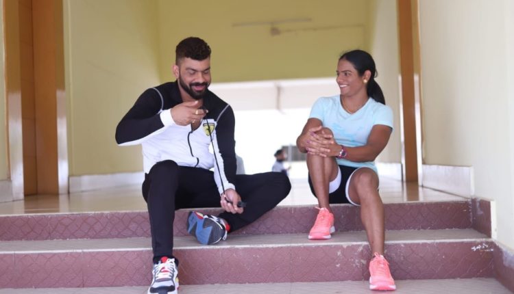 Dutee Chand with Tapi Mishra Manager